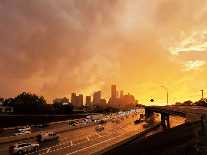 Graphic cityscape of streaming GOLDEN light. Sunset Skyline of Houston Texas looking Southwest from I-10. Kenneth Hudson Photography. 20211023_18381B.jpg